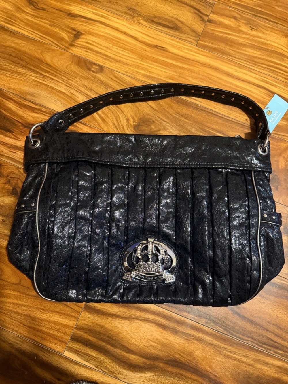 Kathy Van Zeeland Black Pleated Shoulder Bag with Silver Crest